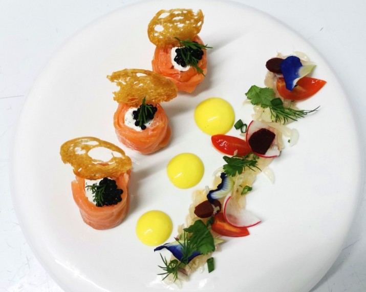<h6 class='prettyPhoto-title'>Smoked salmon rolls with cream cheese and arrenkha caviar</h6>