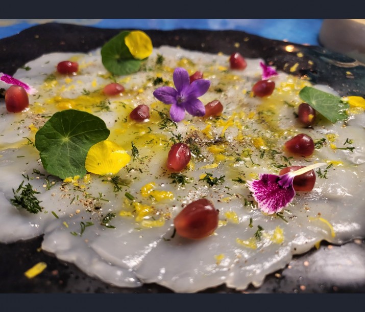 <h6 class='prettyPhoto-title'>Carpaccio of scallops with tangy notes</h6>