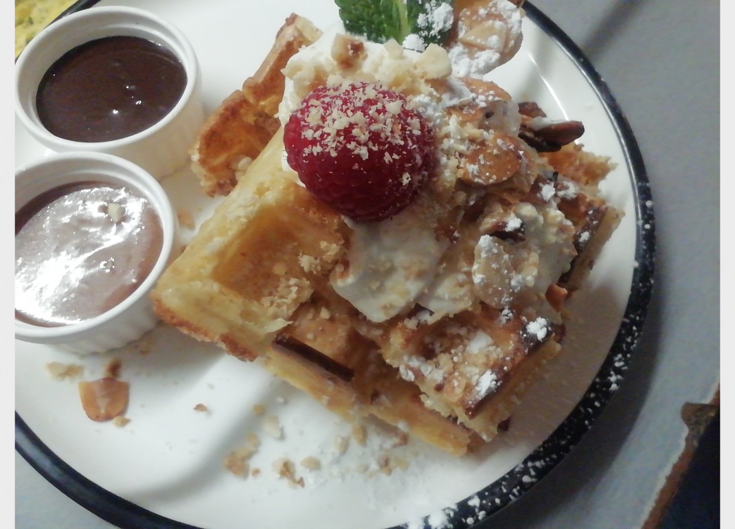 <h3 class='prettyPhoto-title'>The Waffle:</h3><br/>In caramel chocolate whipped cream toasted almonds/hazelnuts
