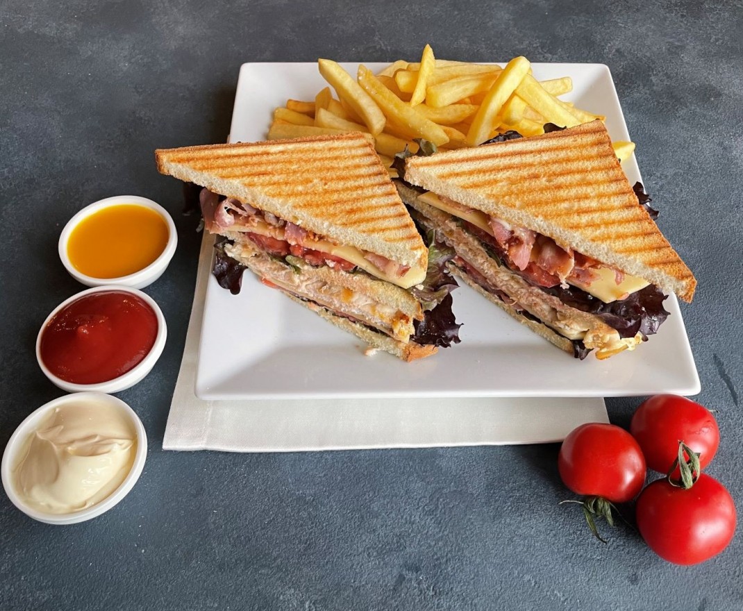 <h6 class='prettyPhoto-title'>“CLUB SANDWICH” CHICKEN BREAST WITH BACON, LETTUCE, TOMATO AND CHEESE</h6>