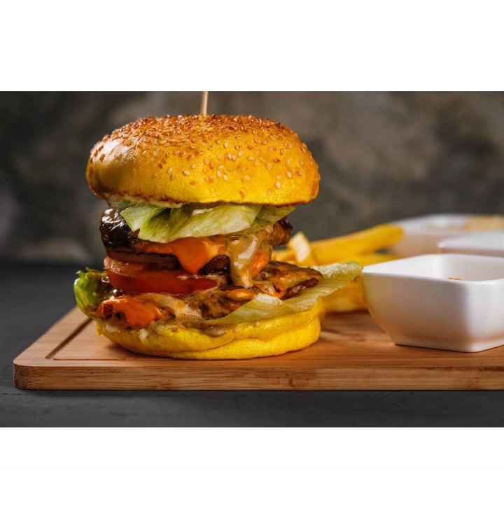 <h6 class='prettyPhoto-title'>Organika Chicken Burger Meal</h6>