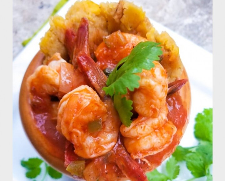 <h6 class='prettyPhoto-title'>Mofongo with shrimps in red sauces</h6>