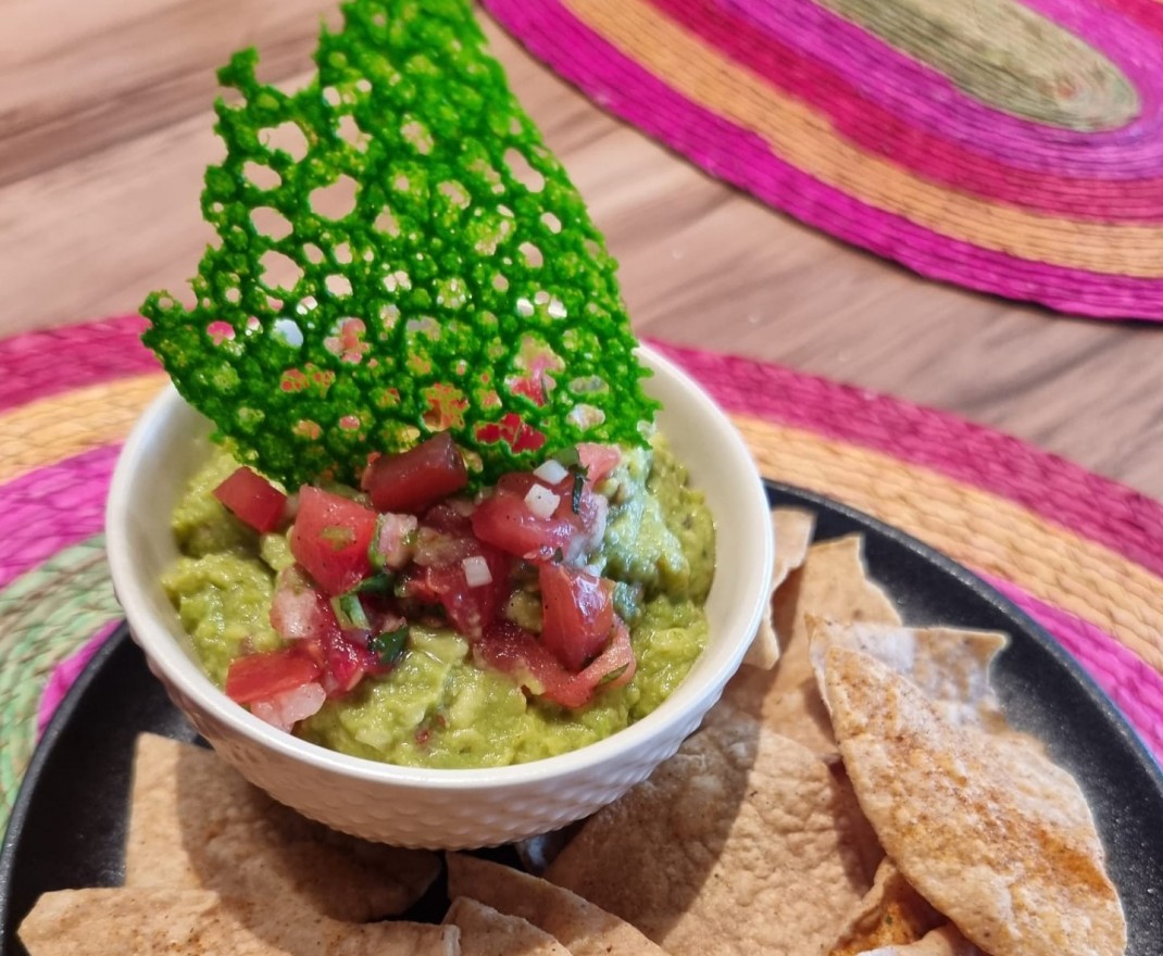 <h6 class='prettyPhoto-title'>Guacamole with Totopos</h6>
