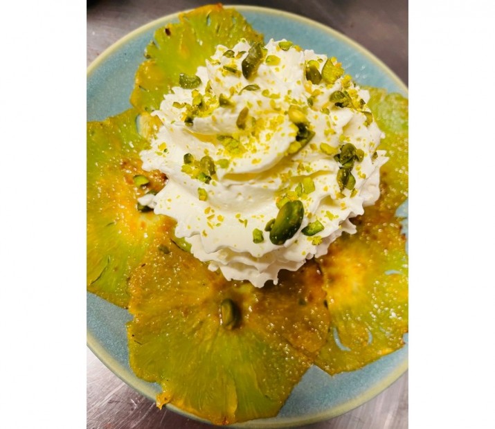 <h3 class='prettyPhoto-title'>Pineapple Carpaccio (Supp3€)</h3><br/>Roasted pineapple carpaccio with rum, pistachio chips, coconut ice cream and pineapple whipped cream. <span style="text-decoration: underline; color: #ff0000;"><strong style="text-align: center;">(Menu supplement 3€)</strong></span>