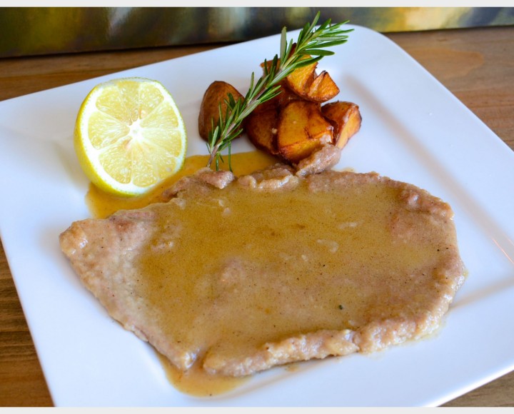 <h6 class='prettyPhoto-title'>Veal escalope in lemon sauce with baked potatoes or vegetables</h6>