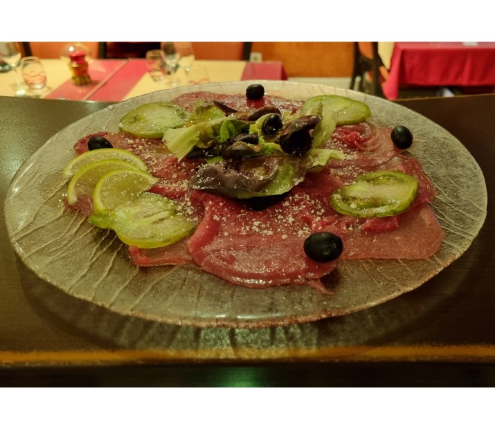 <h6 class='prettyPhoto-title'>Beef carpaccio, olives and parmesan</h6>