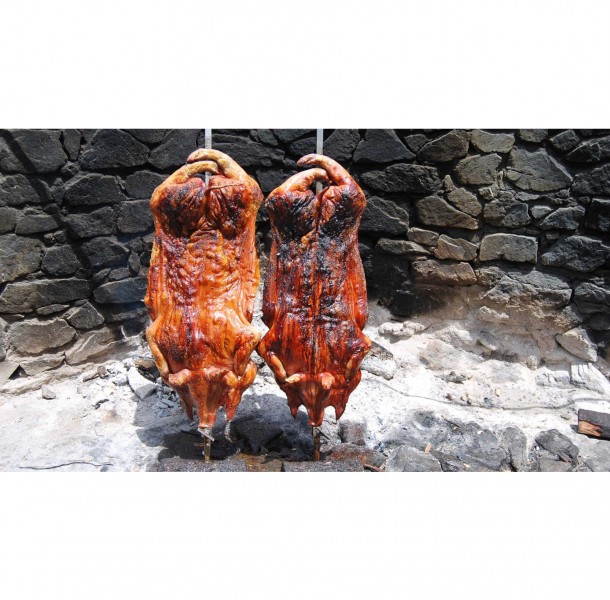 <h6 class='prettyPhoto-title'>Sardinian suckling pig on the spit</h6>