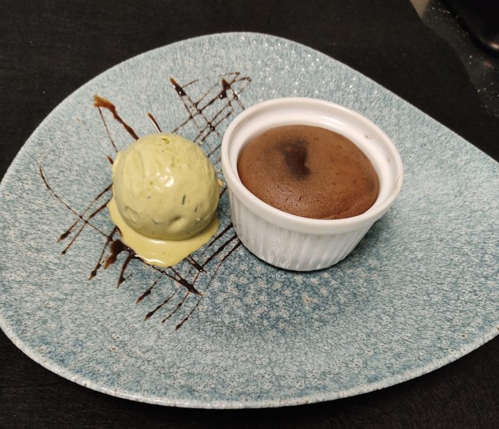 <h6 class='prettyPhoto-title'>Chocolate coulant with pistachio ice cream</h6>