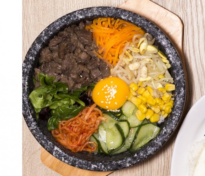 <h3 class='prettyPhoto-title'>Beef Bibimbap</h3><br/>White rice covered with an assortment of vegetables, an egg and marinated beef. Accompanied by miso soup