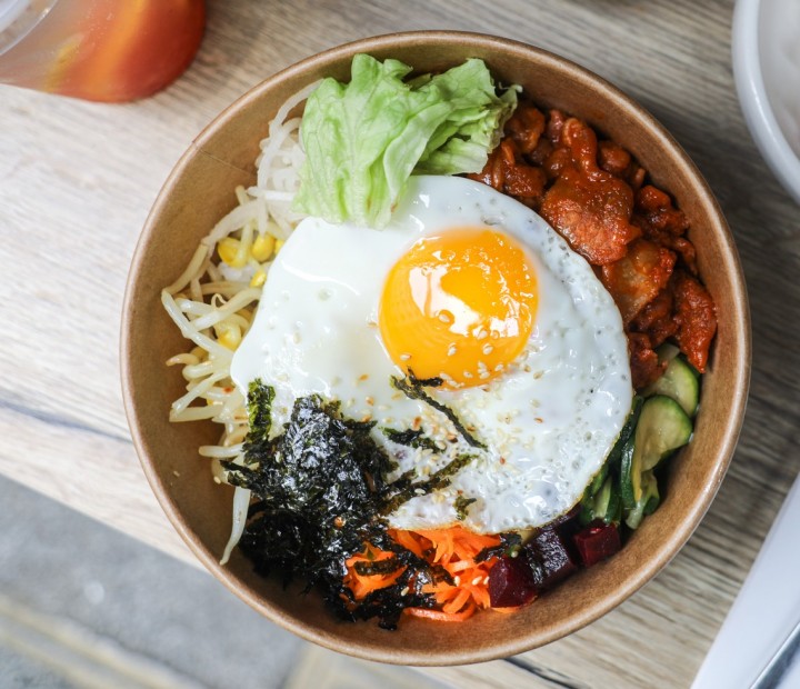 <h3 class='prettyPhoto-title'>Bibimbap Spicy Pork</h3><br/>White rice covered with an assortment of vegetables, an egg and spicy pork. Accompanied by miso soup