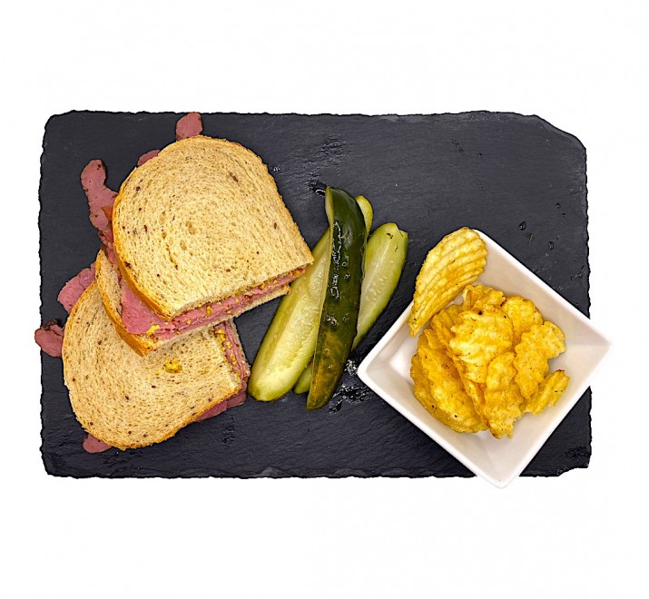 <h6 class='prettyPhoto-title'>New York Style Pastrami Sandwich with Dijon Mustard and Pickles </h6>