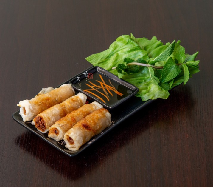<h3 class='prettyPhoto-title'>SPRING ROLLS</h3><br/>Fried pork stuffed rolls, served with salad and nuoc mam sauce