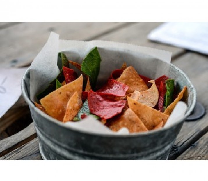 <h6 class='prettyPhoto-title'>Totopos: chipotle, nopal, corn chips accompanied by guacamole and black bean puree</h6>