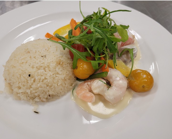 <h6 class='prettyPhoto-title'>Assorted Seafood with Garlic Cream Sauce and Pilaf Rice</h6>