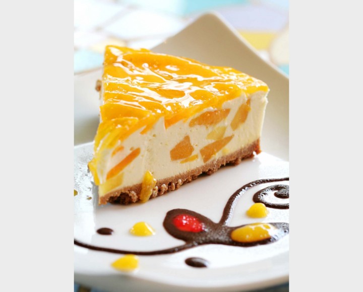 <h6 class='prettyPhoto-title'>Double Baked Cheese Cake with Mango Sauce</h6>