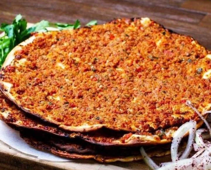<h6 class='prettyPhoto-title'>Lahmacun (Turkish pizza) served by 2</h6>