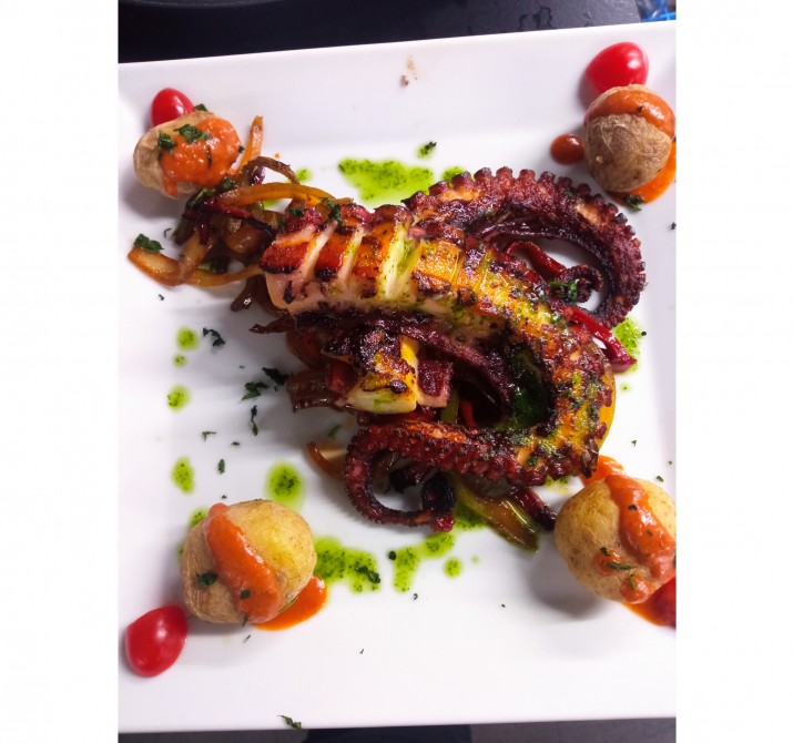 <h6 class='prettyPhoto-title'>Roasted octopus with Provencal vegetables</h6>