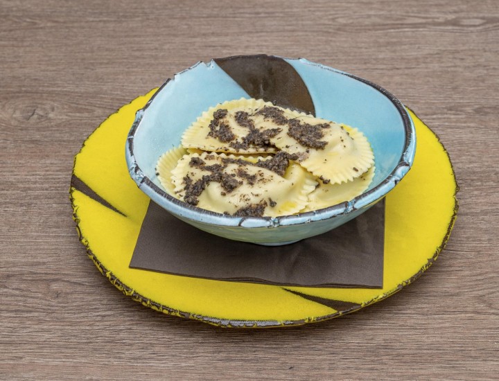 <h3 class='prettyPhoto-title'>Ravioli With Ceps And Summer Truffle**</h3><br/>Egg pasta stuffed with porcini mushrooms and summer truffles